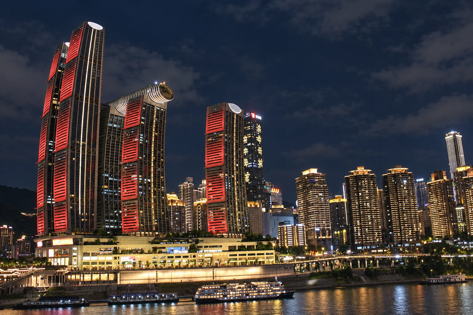 Raffles City towers and their elevated horizontal conservatory at night